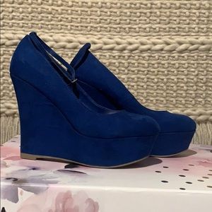 Royal blue suede wedge pumps